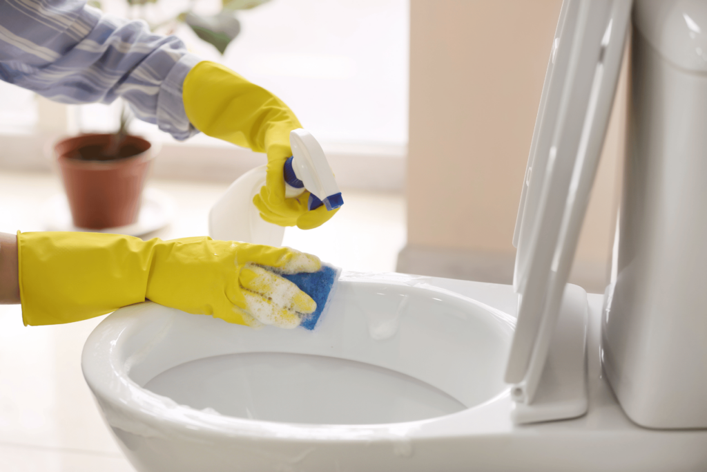 stay at home mom cleaning the bathroom