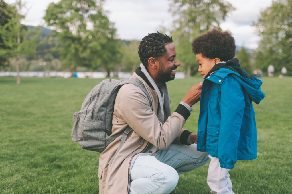 dad getting child ready for school