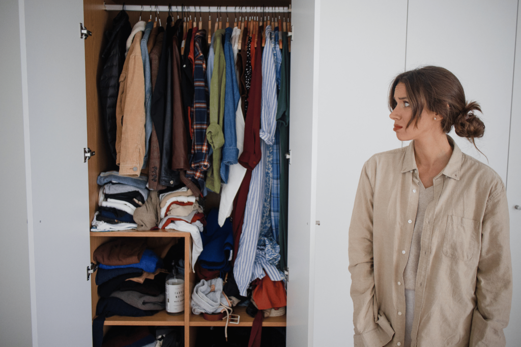 mom with cluttered closet