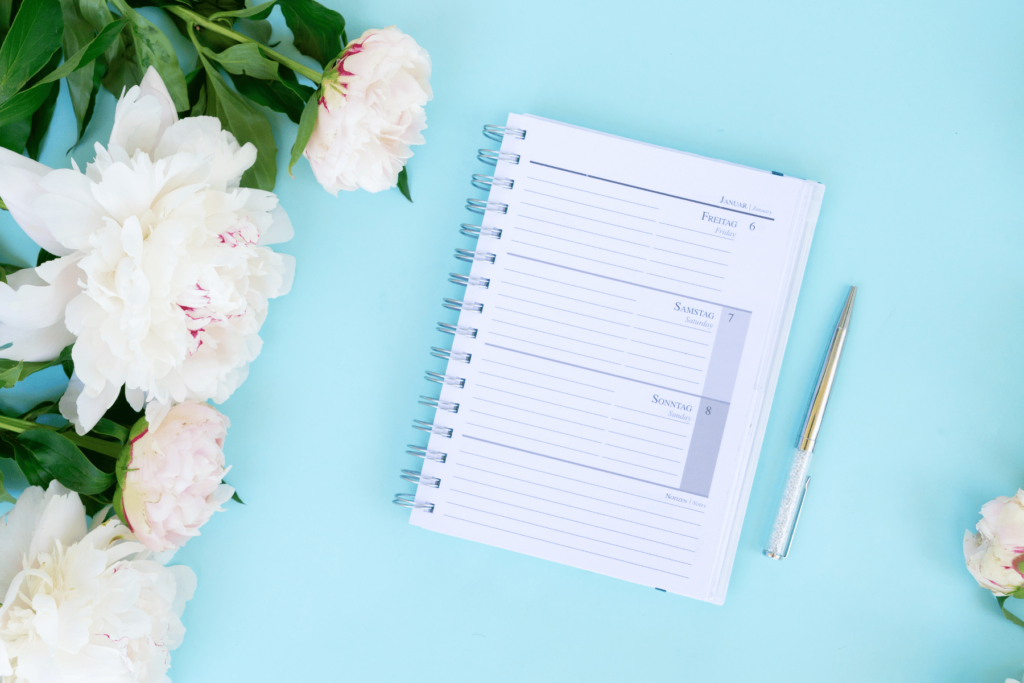 weekly planner and flowers