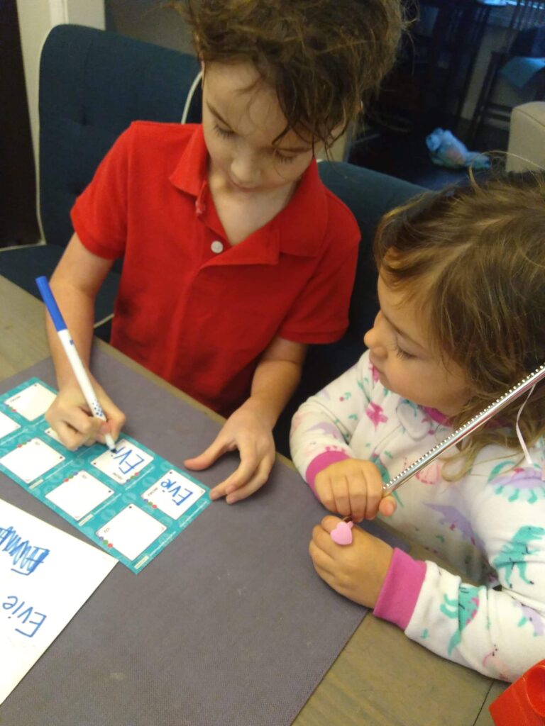 kids signing valentines