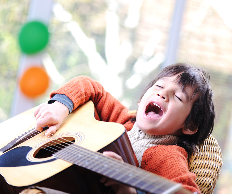 kid playing guitar